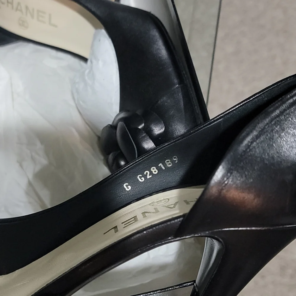 CHANEL Black Leather Camellia Peep-Toe Pumps